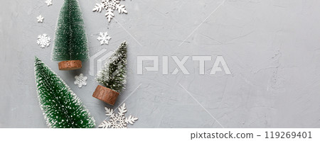 Flat lay composition with christmas trees on color background. Top view with copy space 119269401