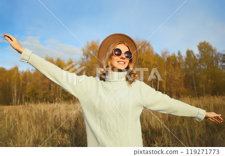 Stylish modern happy young woman having fun dancing, fashionable girl smiling outdoors, autumn park 119271773