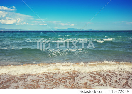 Seascape on a sunny day, view of sunny bay in Aegean sea in Chalkidiki, Greece Seascape on a sunny day, view of sunny bay in Aegean sea in Chalkidiki, Greece 119272059