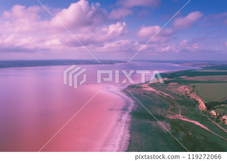 Landscape with Pink lake and cloudy sky. Panoramic view from above at Pink lake Landscape with Pink lake and cloudy sky. Panoramic view from above at Pink lake 119272066