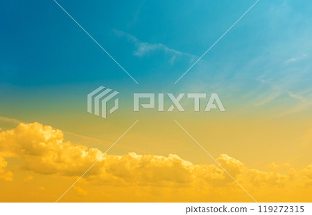 Colorful cloudy sky at sunset. Blue yellow gradient color. Sky texture, abstract nature background 119272315