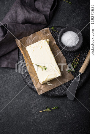 Fresh butter on grey backgrouns. Fresh butter on grey backgrouns. 119273683