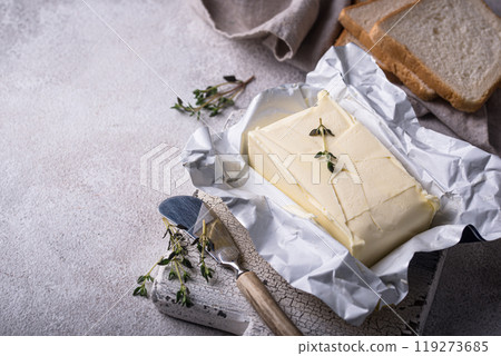 Fresh butter on grey backgrouns. Fresh butter on grey backgrouns. 119273685