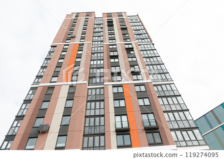 Modern high-rise apartment buildings in a residential area showcasing rental and mortgage options 119274095