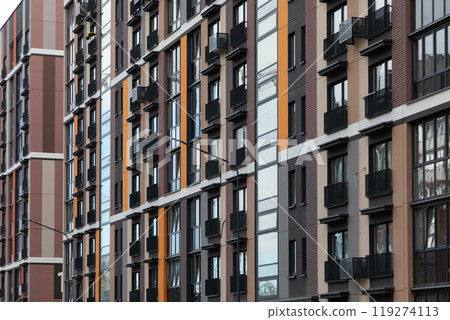 Modern high-rise apartment buildings in a residential neighborhood highlighting rental and mortgage 119274113