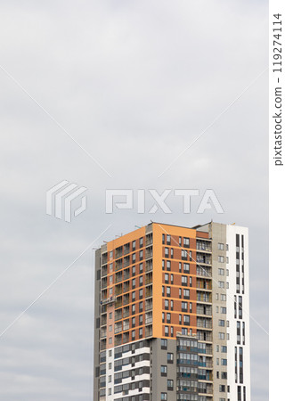 High-rise apartment buildings in a residential neighborhood, showcasing modern architecture and 119274114