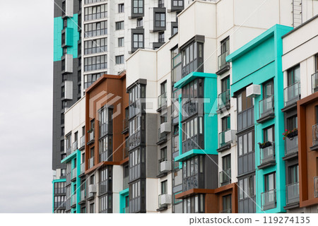 High-rise residential buildings showcasing modern architecture in an urban setting with multiple High-rise residential buildings showcasing modern architecture in an urban setting with multiple 119274135