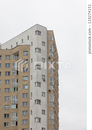 Modern high-rise apartment buildings in a residential area highlighting urban living, rental options Modern high-rise apartment buildings in a residential area highlighting urban living, rental options 119274151