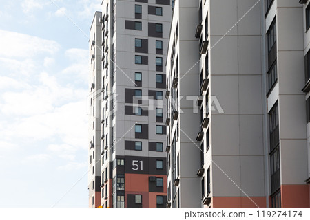 High-rise apartment buildings in a residential area highlighting rental and mortgage options for 119274174