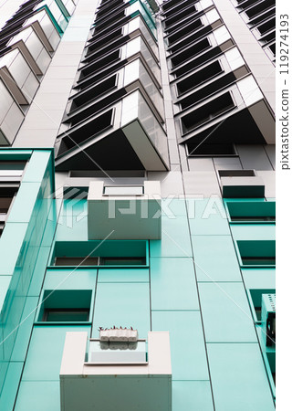 High-rise apartment buildings in a residential area showcasing modern architecture and rental High-rise apartment buildings in a residential area showcasing modern architecture and rental 119274193