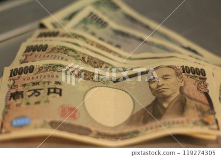Fukuoka-shi, Fukuoka-Ken, Hakata-ku, Japan - October 13, 2024: Japan's banknotes will undergo a currency reform with a new design. 100,000 yen paper note, currency Fukuoka-shi, Fukuoka-Ken, Hakata-ku, Japan - October 13, 2024: Japan's banknotes will undergo a currency reform with a new design. 100,000 yen paper note, currency 119274305