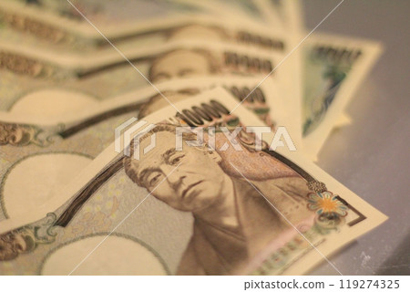 Fukuoka-shi, Fukuoka-Ken, Hakata-ku, Japan - October 13, 2024: Japan's banknotes will undergo a currency reform with a new design. 100,000 yen paper note, currency Fukuoka-shi, Fukuoka-Ken, Hakata-ku, Japan - October 13, 2024: Japan's banknotes will undergo a currency reform with a new design. 100,000 yen paper note, currency 119274325