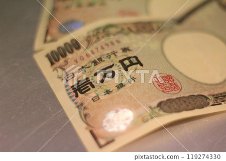 Fukuoka-shi, Fukuoka-Ken, Hakata-ku, Japan - October 13, 2024: Japan's banknotes will undergo a currency reform with a new design. 100,000 yen paper note, currency Fukuoka-shi, Fukuoka-Ken, Hakata-ku, Japan - October 13, 2024: Japan's banknotes will undergo a currency reform with a new design. 100,000 yen paper note, currency 119274330