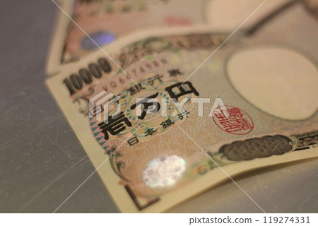 Fukuoka-shi, Fukuoka-Ken, Hakata-ku, Japan - October 13, 2024: Japan's banknotes will undergo a currency reform with a new design. 100,000 yen paper note, currency Fukuoka-shi, Fukuoka-Ken, Hakata-ku, Japan - October 13, 2024: Japan's banknotes will undergo a currency reform with a new design. 100,000 yen paper note, currency 119274331