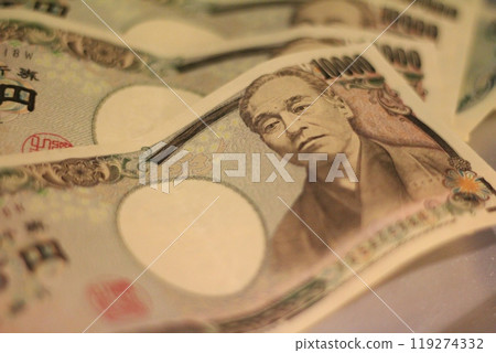Fukuoka-shi, Fukuoka-Ken, Hakata-ku, Japan - October 13, 2024: Japan's banknotes will undergo a currency reform with a new design. 100,000 yen paper note, currency Fukuoka-shi, Fukuoka-Ken, Hakata-ku, Japan - October 13, 2024: Japan's banknotes will undergo a currency reform with a new design. 100,000 yen paper note, currency 119274332