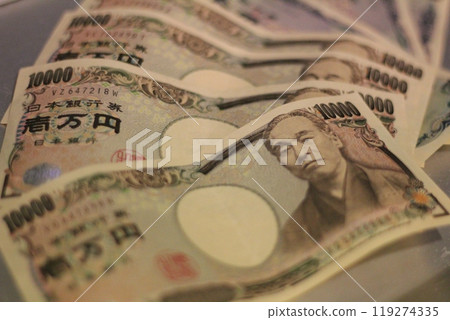 Fukuoka-shi, Fukuoka-Ken, Hakata-ku, Japan - October 13, 2024: Japan's banknotes will undergo a currency reform with a new design. 100,000 yen paper note, currency Fukuoka-shi, Fukuoka-Ken, Hakata-ku, Japan - October 13, 2024: Japan's banknotes will undergo a currency reform with a new design. 100,000 yen paper note, currency 119274335