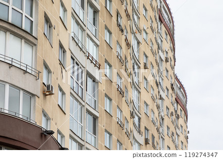 High-rise apartment buildings in a residential area highlighting rental and mortgage options as well 119274347