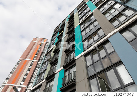 Modern high-rise apartment buildings in a vibrant residential area with various rental options and Modern high-rise apartment buildings in a vibrant residential area with various rental options and 119274348