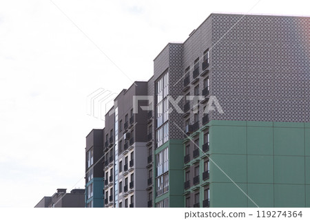 Modern high-rise apartment buildings in a residential area focusing on rent, mortgage, and property Modern high-rise apartment buildings in a residential area focusing on rent, mortgage, and property 119274364