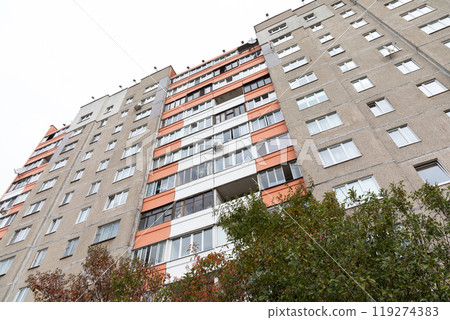 High-rise apartment buildings in a residential area showcasing options for rent and mortgage in the 119274383