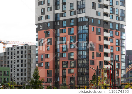 Newly constructed high-rise apartment buildings in a residential area with various rental and 119274393