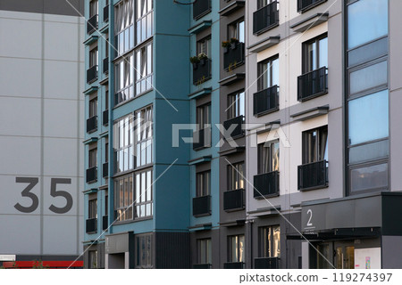 Modern high-rise apartment buildings in a bustling residential area for rent or mortgage with 119274397