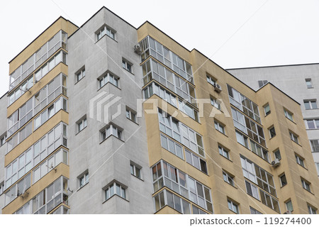 High-rise apartment buildings in a residential area highlighting the housing market trends of rent 119274400