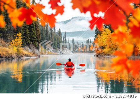 A kayaker enjoys a peaceful journey on calm waters 119274939