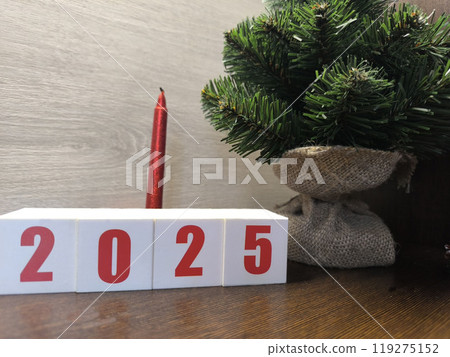 The red numbers 2025 on the white Christmas cubes. The red numbers 2025 on the white Christmas cubes. 119275152