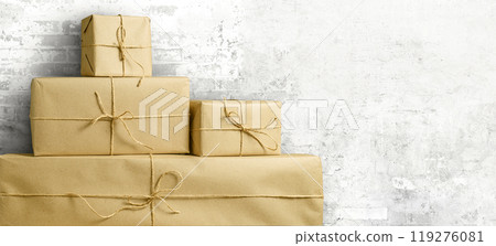 Beautifully wrapped gifts, carefully stacked, ideal for celebrations or special occasions Beautifully wrapped gifts, carefully stacked, ideal for celebrations or special occasions 119276081