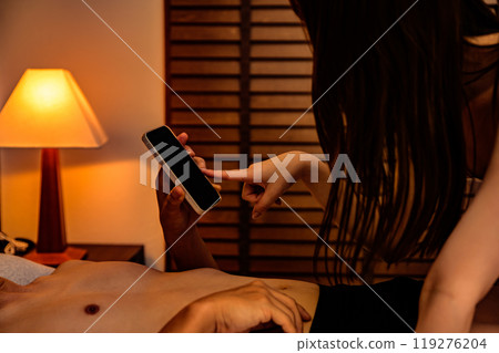 Couples asking for confirmation of sexual consent via smartphone; Man asking for consent from woman; Clear confirmation of intent to engage in sexual activity 119276204