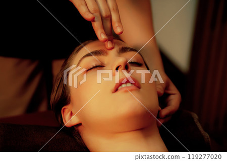 Caucasian woman enjoying relaxing anti-stress head massage. Quiescent 119277020