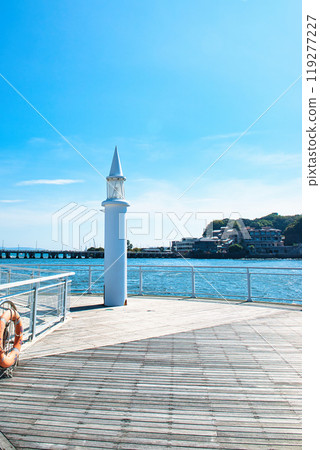 View of the white lighthouse from the West Promenade of Enoshima View of the white lighthouse from the West Promenade of Enoshima 119277227