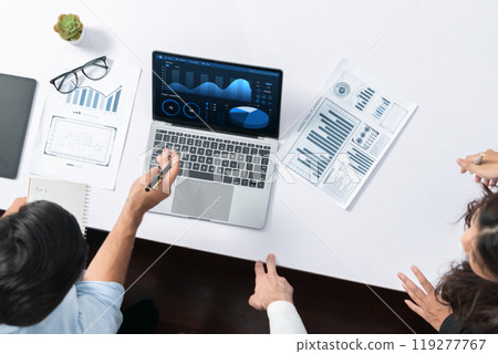 Analyst team uses BI Fintech on a laptop to analyze financial data. Prudent Analyst team uses BI Fintech on a laptop to analyze financial data. Prudent 119277767