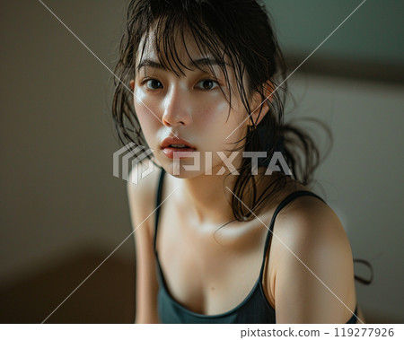 Young woman wearing a black crop top 119277926