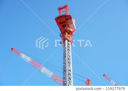 Crane at a high-rise building construction site in a local city 119277979