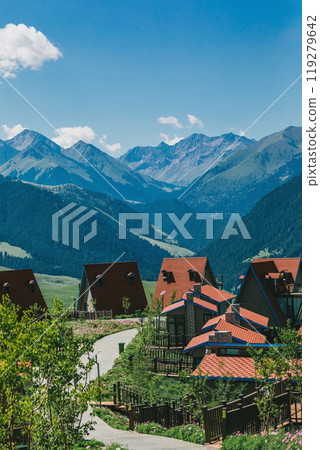 Mountain village with scenic peaks 119279642