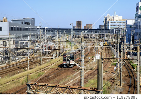 Rapid Mie and Kintetsu trains running on a section with three different track widths near Kuwana Station Rapid Mie and Kintetsu trains running on a section with three different track widths near Kuwana Station 119279895