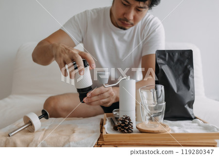 Step by step of man making espresso with hand press tools. Step by step of man making espresso with hand press tools. 119280347