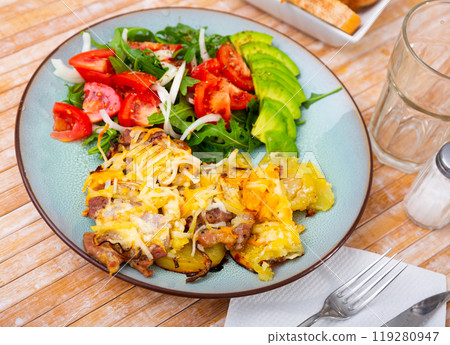 French style meat with potatoes and vegetable salad French style meat with potatoes and vegetable salad 119280947