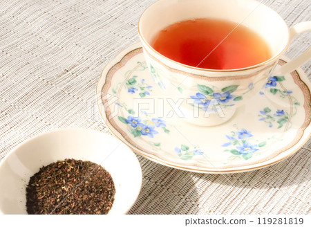 Black tea and tea leaves Black tea and tea leaves 119281819