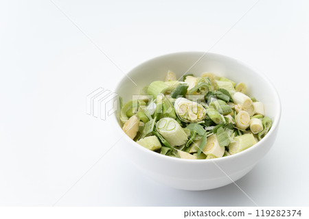 Freeze-dried chopped green onions on a plate 119282374