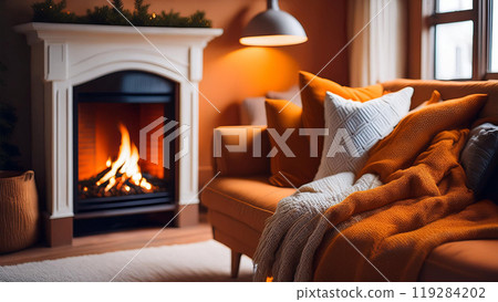 帶壁爐的房間沙發上的毯子 119284202