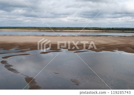 Shallow river with a large sandy beach Shallow river with a large sandy beach 119285743