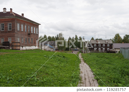 Wooden sidewalk in ancient Russian town 119285757