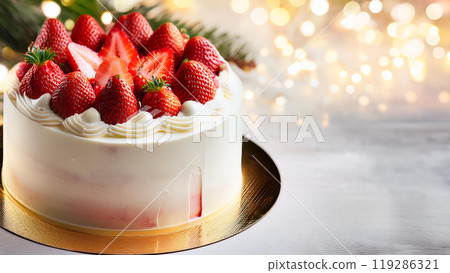 Strawberry filled Christmas cake with sparkling background 119286321