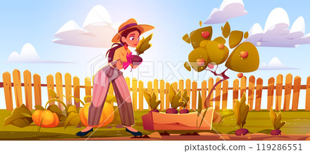 Young woman gardening on yard or field with fence 119286551