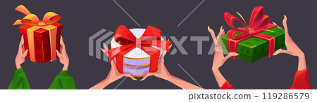 Female hands holding gift box Female hands holding gift box 119286579