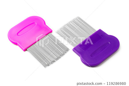 Colorful plastic and metal combs on a white background Colorful plastic and metal combs on a white background 119286980