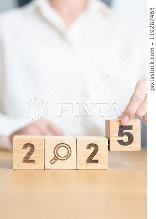 2025 block with magnifying glass icon. SEO, Search Engine Optimization, hiring , Advertising, Idea, Strategy, marketing, Keyword, Content and New Year start concepts 119287463